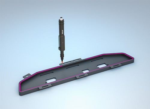 DELO-DIV Volumetric Dispense System Dispensing a Line of Adhesive