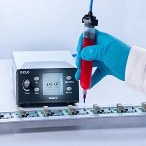 DELOMAT 101 Dispense System in Operation Dispensing Material